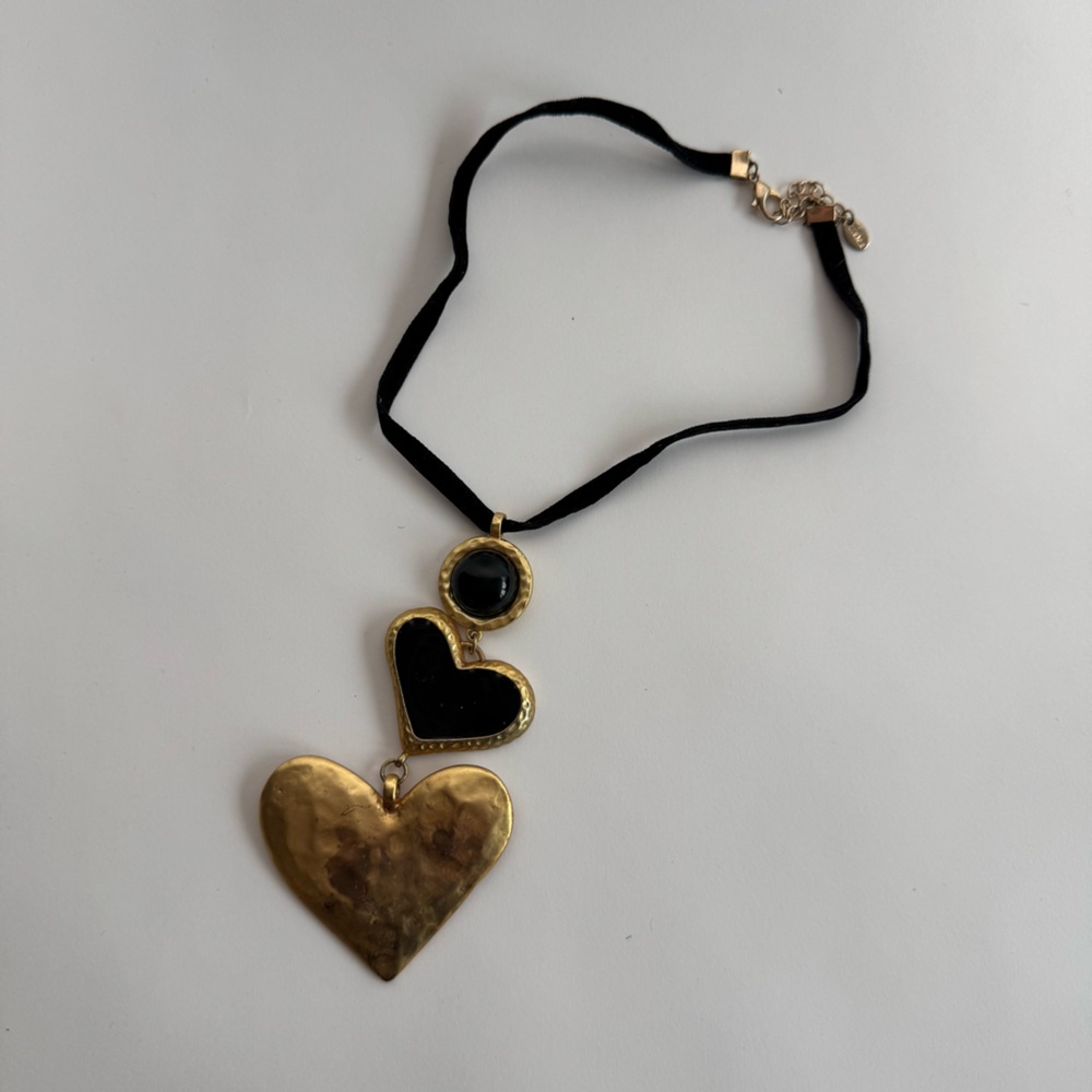 Super beautiful gold heart necklace on a black velvet chain